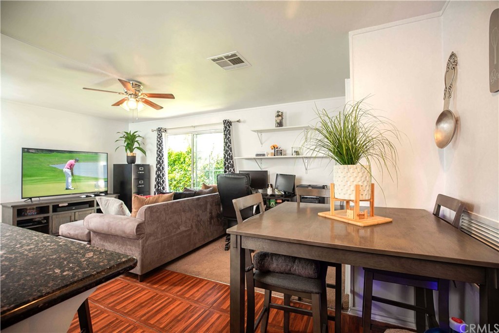 2021 Forest Avenue Pasadena, CA 91103 - Photo 9 of 18 a living room with furniture and a flat screen tv