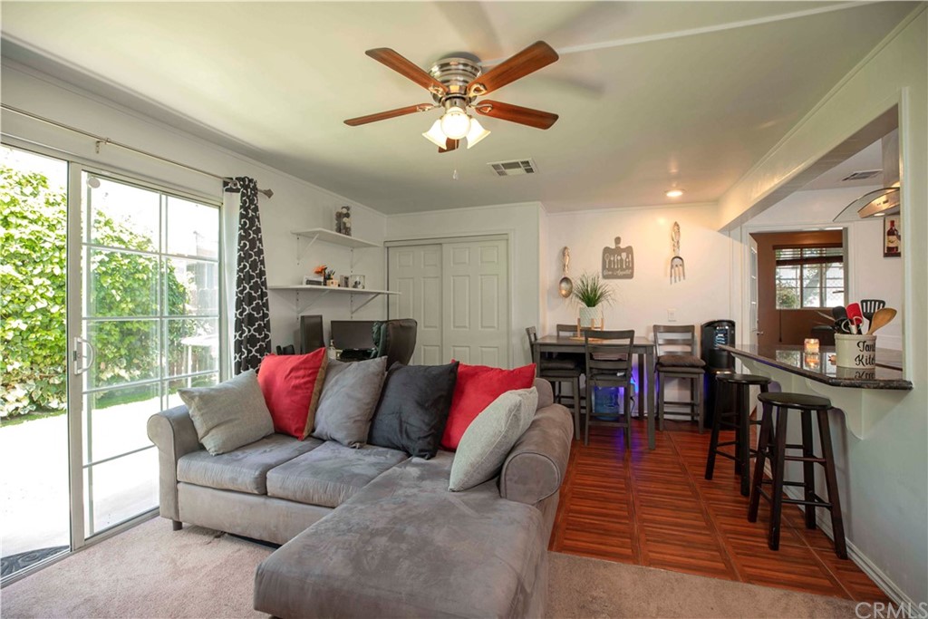 2021 Forest Avenue Pasadena, CA 91103 - Photo 10 of 18 a living room with furniture kitchen view and a large window