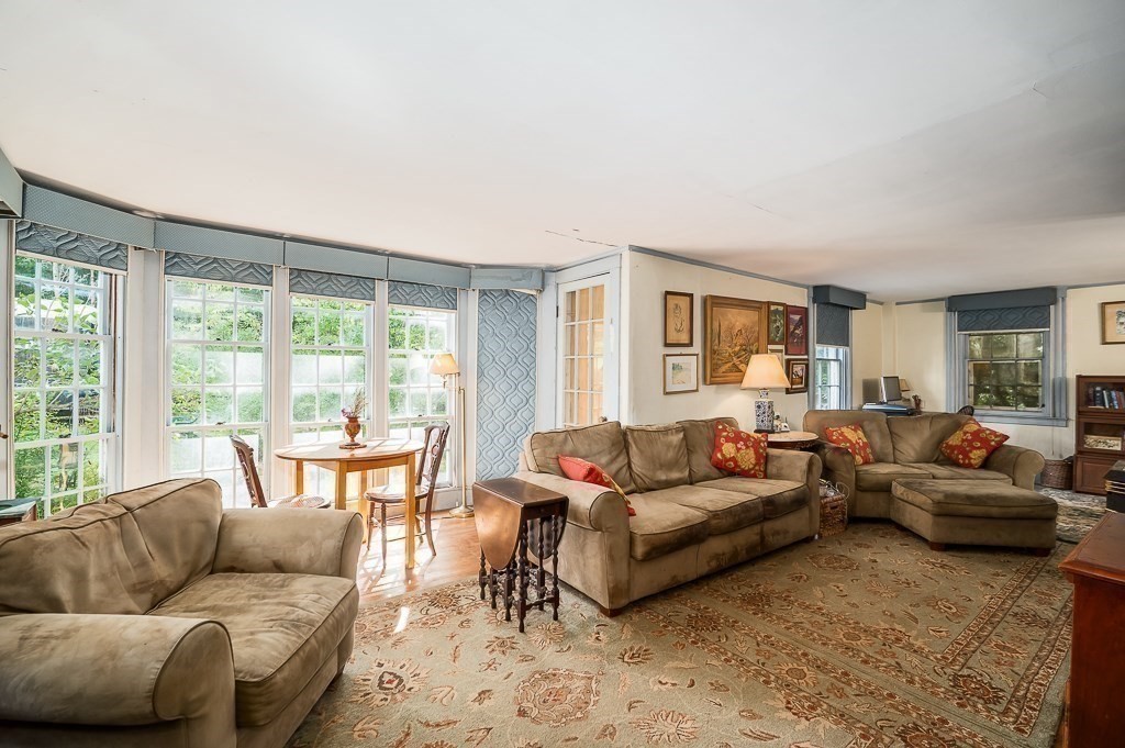 3 Ipswich Road Boxford, MA 01921 - Photo 12 of 37 a living room with furniture and a large window