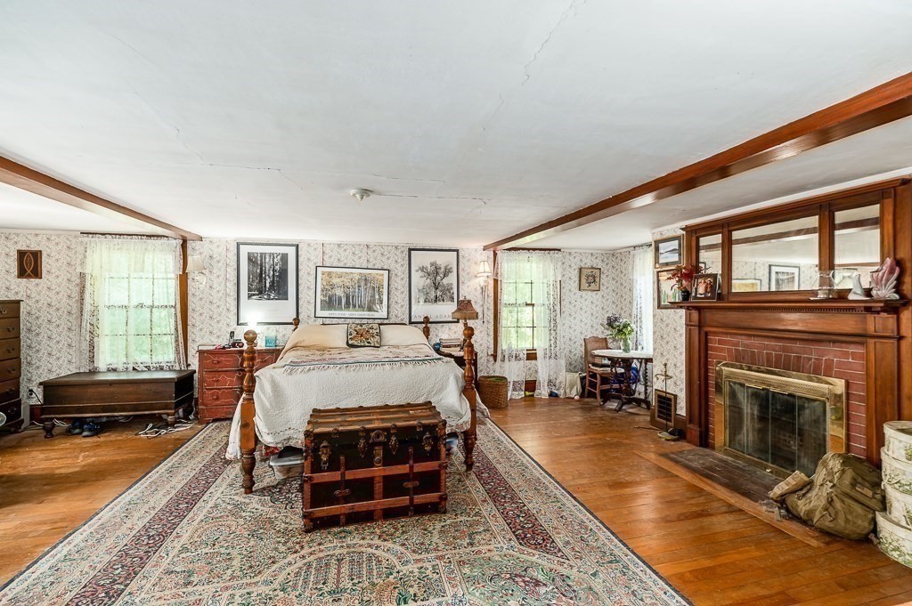 3 Ipswich Road Boxford, MA 01921 - Photo 19 of 37 a bed room with a bed and furniture