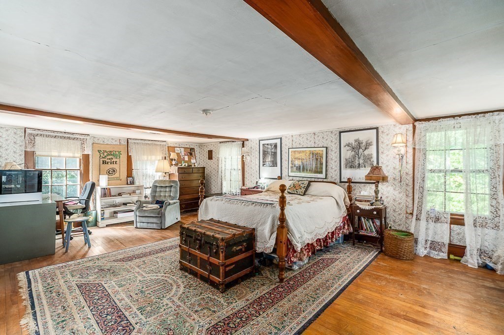 3 Ipswich Road Boxford, MA 01921 - Photo 20 of 37 a bed room with a bed and glass walk in closet