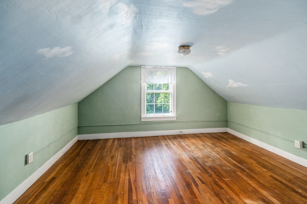 3 Ipswich Road Boxford, MA 01921 - Photo 26 of 37 a view of an empty room with wooden floor and a window