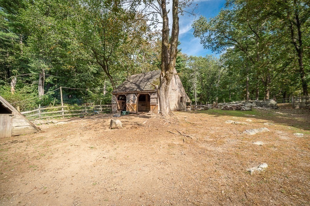 3 Ipswich Road Boxford, MA 01921 - Photo 34 of 37 a backyard of a house with large trees and outdoor space