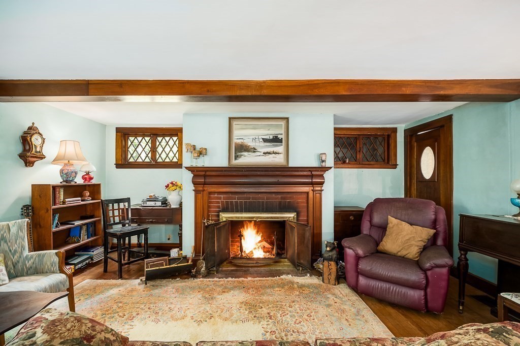 3 Ipswich Road Boxford, MA 01921 - Photo 7 of 37 a living room with furniture and a fireplace
