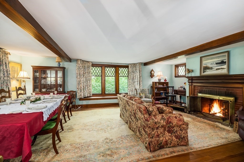 3 Ipswich Road Boxford, MA 01921 - Photo 8 of 37 a living room with furniture large window and a fireplace