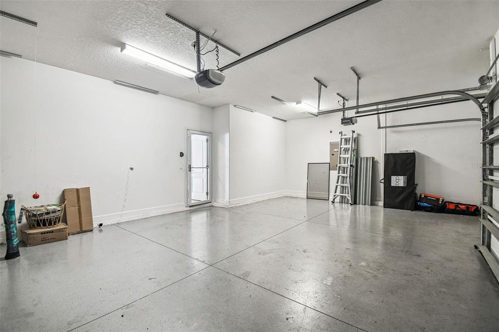 11737 Crestridge Loop New Port Richey, FL 34655 - Photo 72 of 100 a view of a livingroom with furniture and a ceiling fan