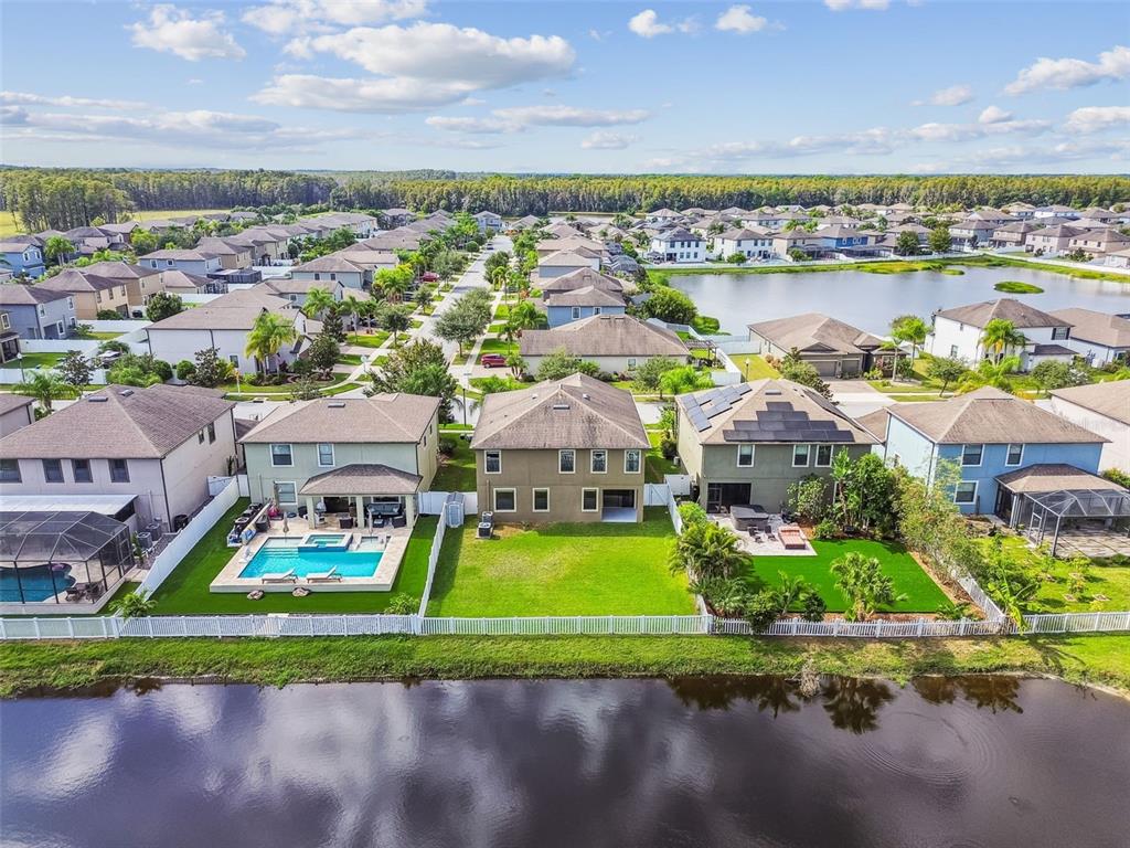 11737 Crestridge Loop New Port Richey, FL 34655 - Photo 93 of 100 an aerial view of a house with a ocean view