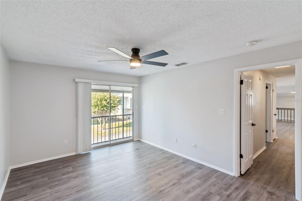 4449 Ring Neck Road, Unit C Orlando, FL 32808 - Photo 15 of 29 a view of an empty room with a window
