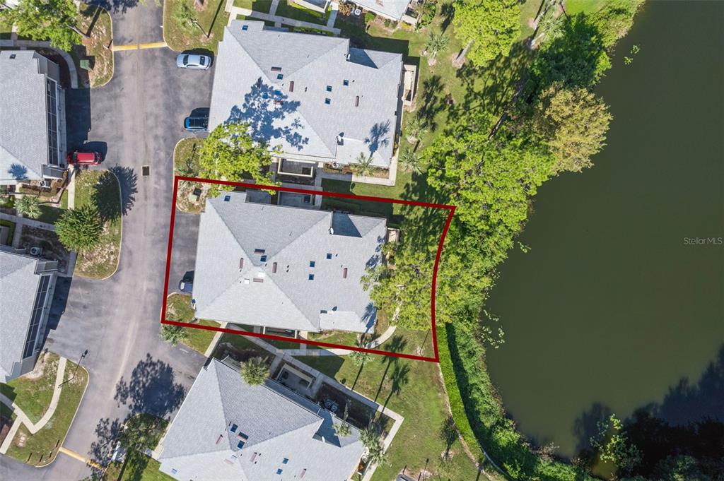 4449 Ring Neck Road, Unit C Orlando, FL 32808 - Photo 24 of 29 an aerial view of a houses with yard