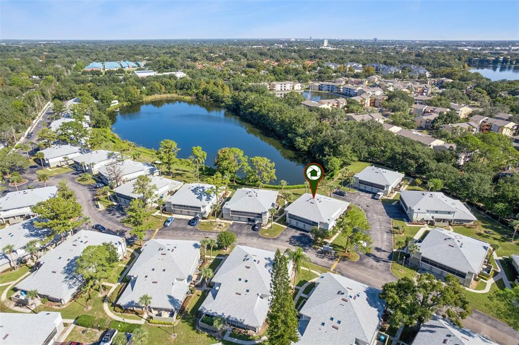 4449 Ring Neck Road, Unit C Orlando, FL 32808 - Photo 27 of 29 an aerial view of multiple house