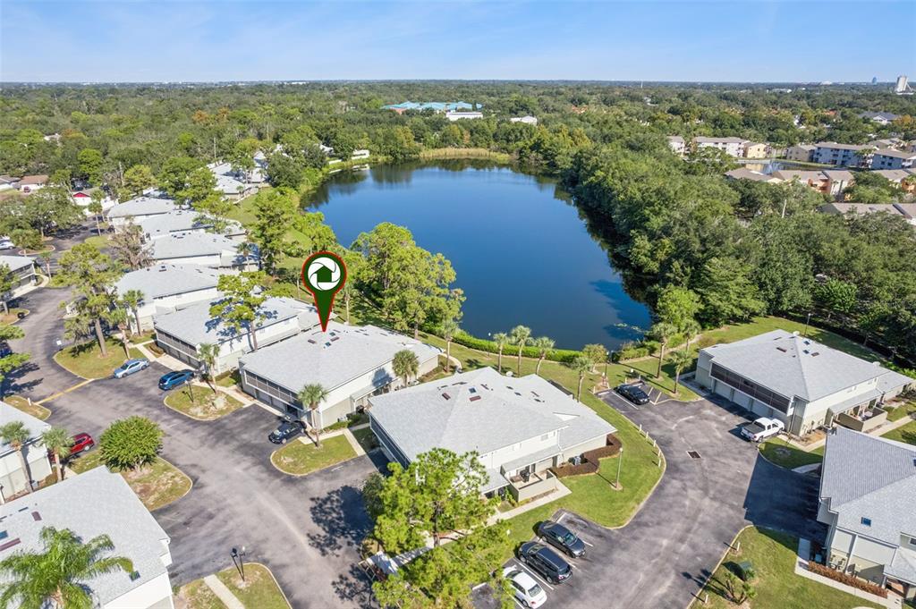 4449 Ring Neck Road, Unit C Orlando, FL 32808 - Photo 3 of 29 an aerial view of residential houses with outdoor space