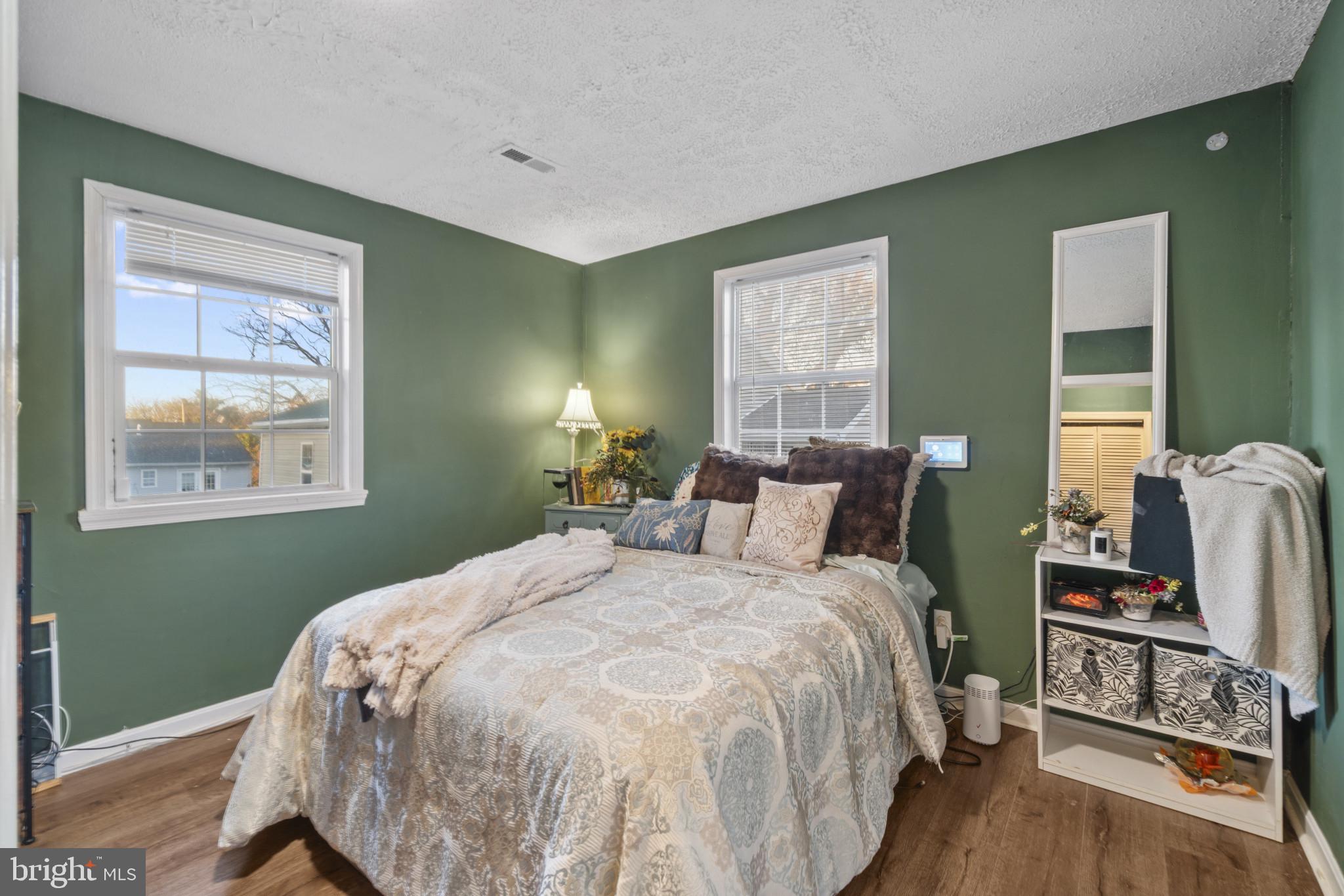 5904 Belle Grove Road Baltimore, MD 21225 - Photo 12 of 32 a bedroom with a bed and a window