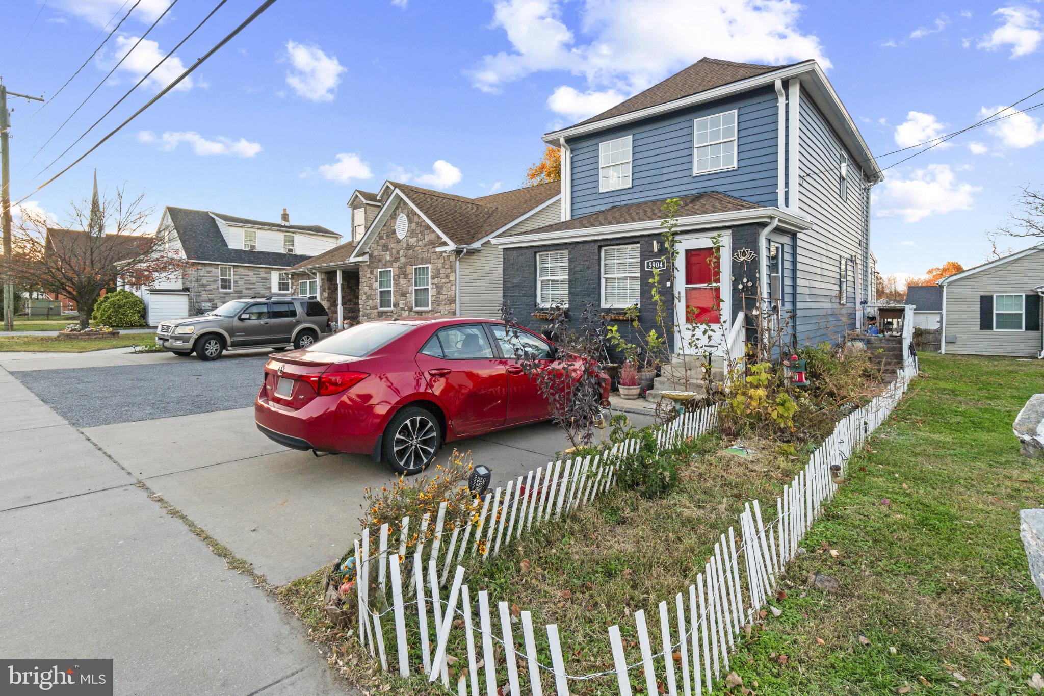 5904 Belle Grove Road Baltimore, MD 21225 - Photo 30 of 32 a front view of a house with garden