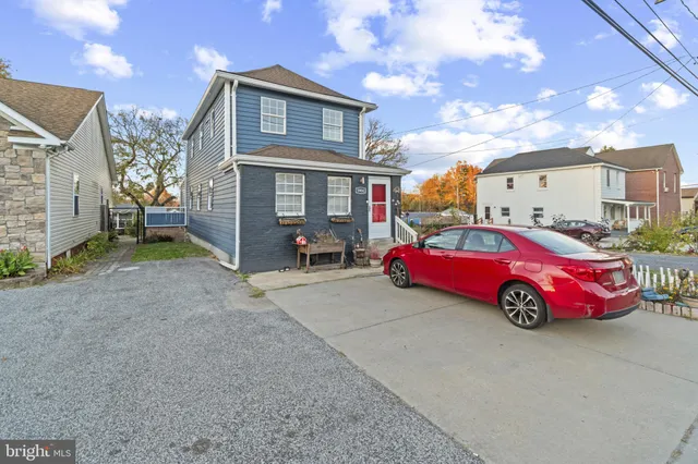 a car parked in front of a house