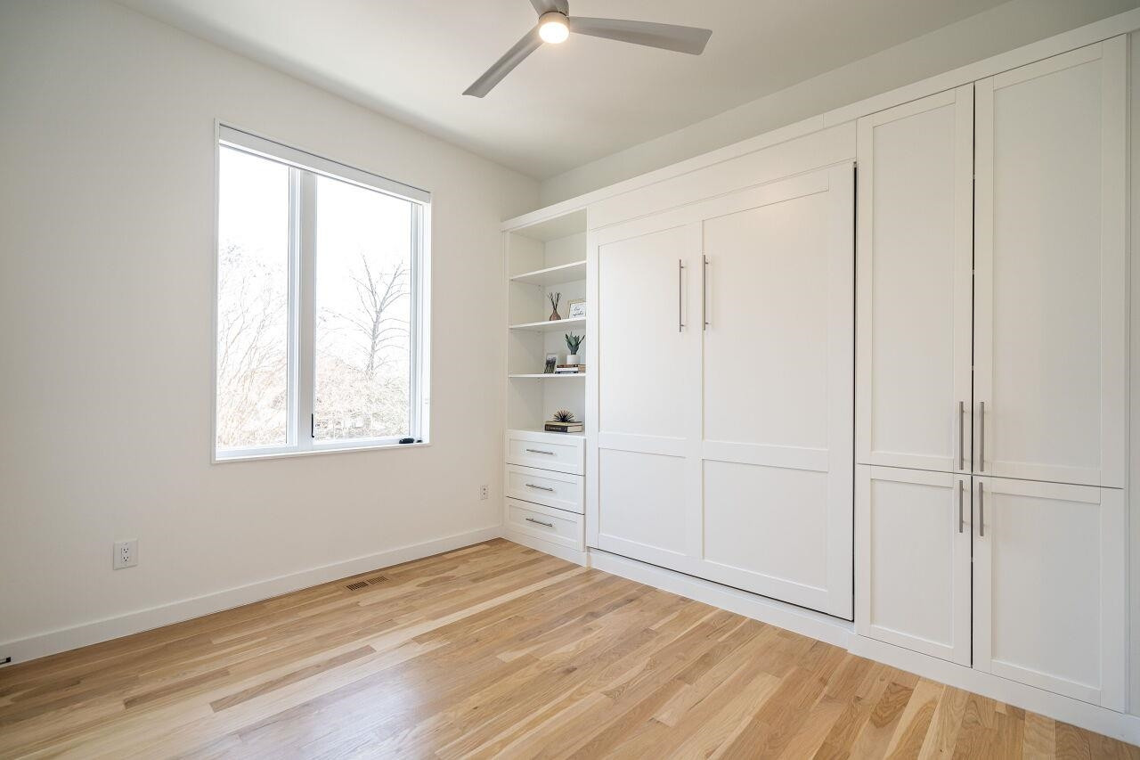 424 Chavis Way Raleigh, NC 27601 - Photo 16 of 23 an empty room with a empty space and windows