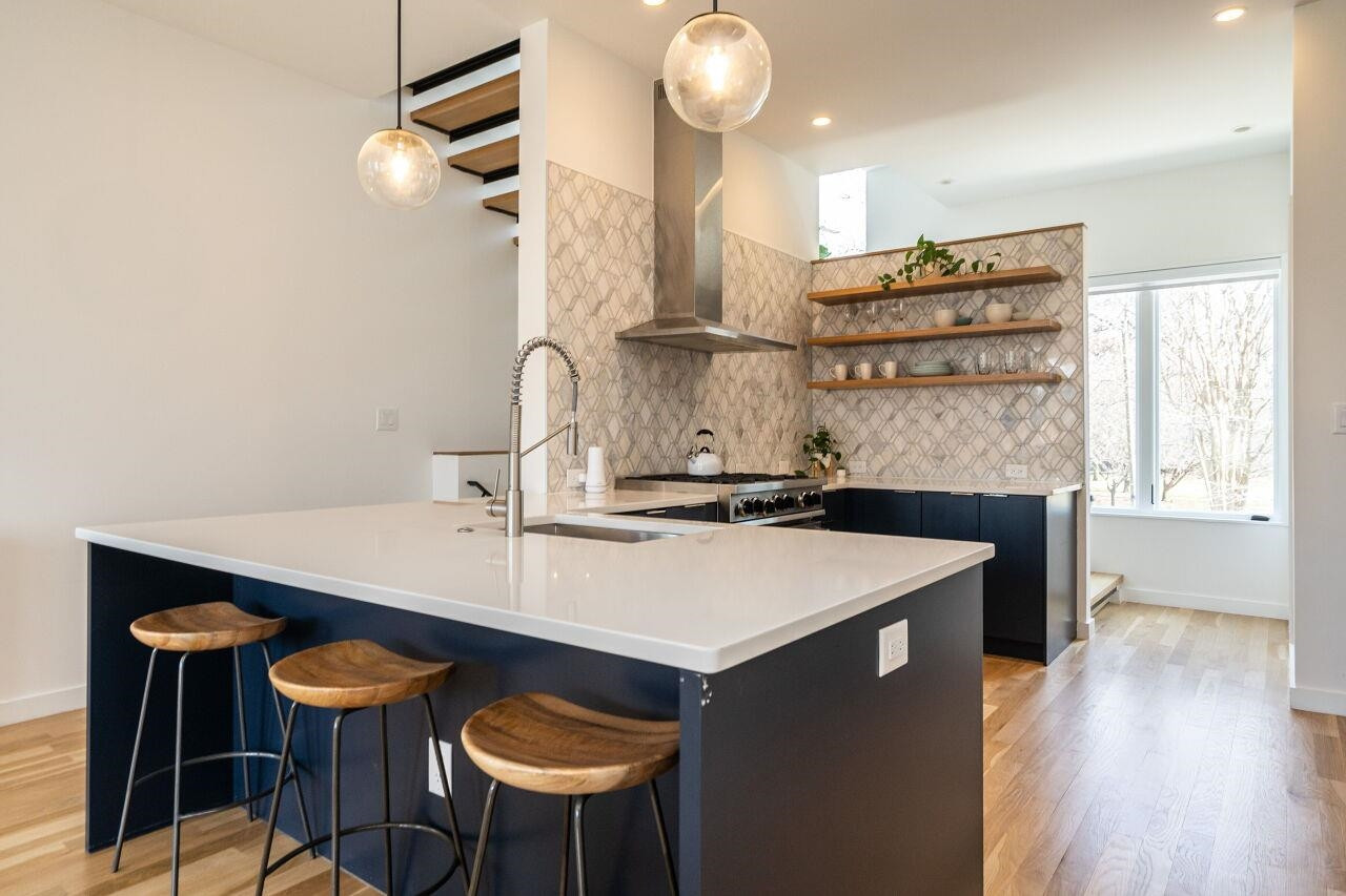 424 Chavis Way Raleigh, NC 27601 - Photo 7 of 23 a kitchen with a table and chairs in it