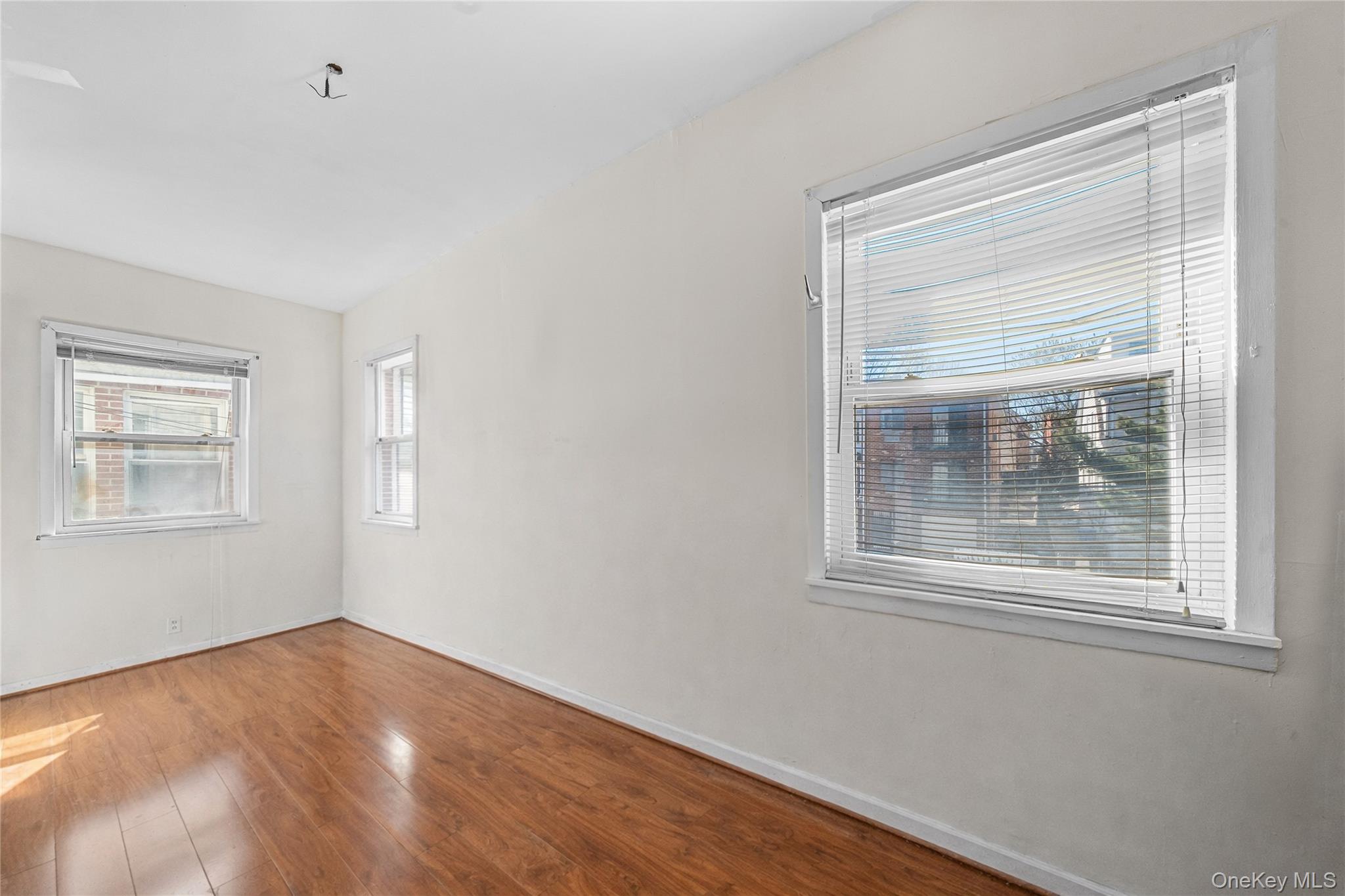 39-27 57th Street Queens, NY 11377 - Photo 15 of 35 a view of empty room with window