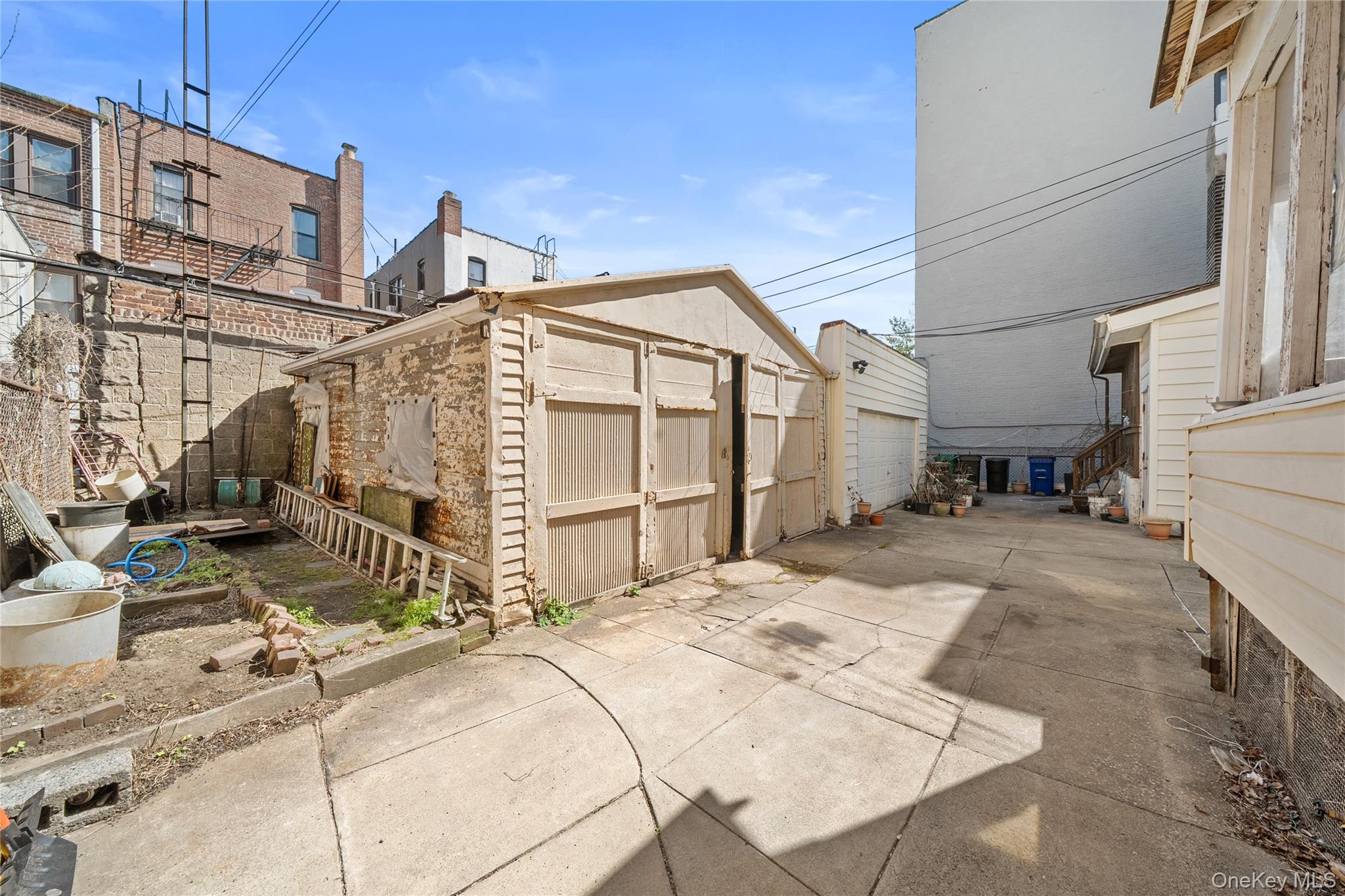 39-27 57th Street Queens, NY 11377 - Photo 30 of 35 a view of a backyard with sitting area