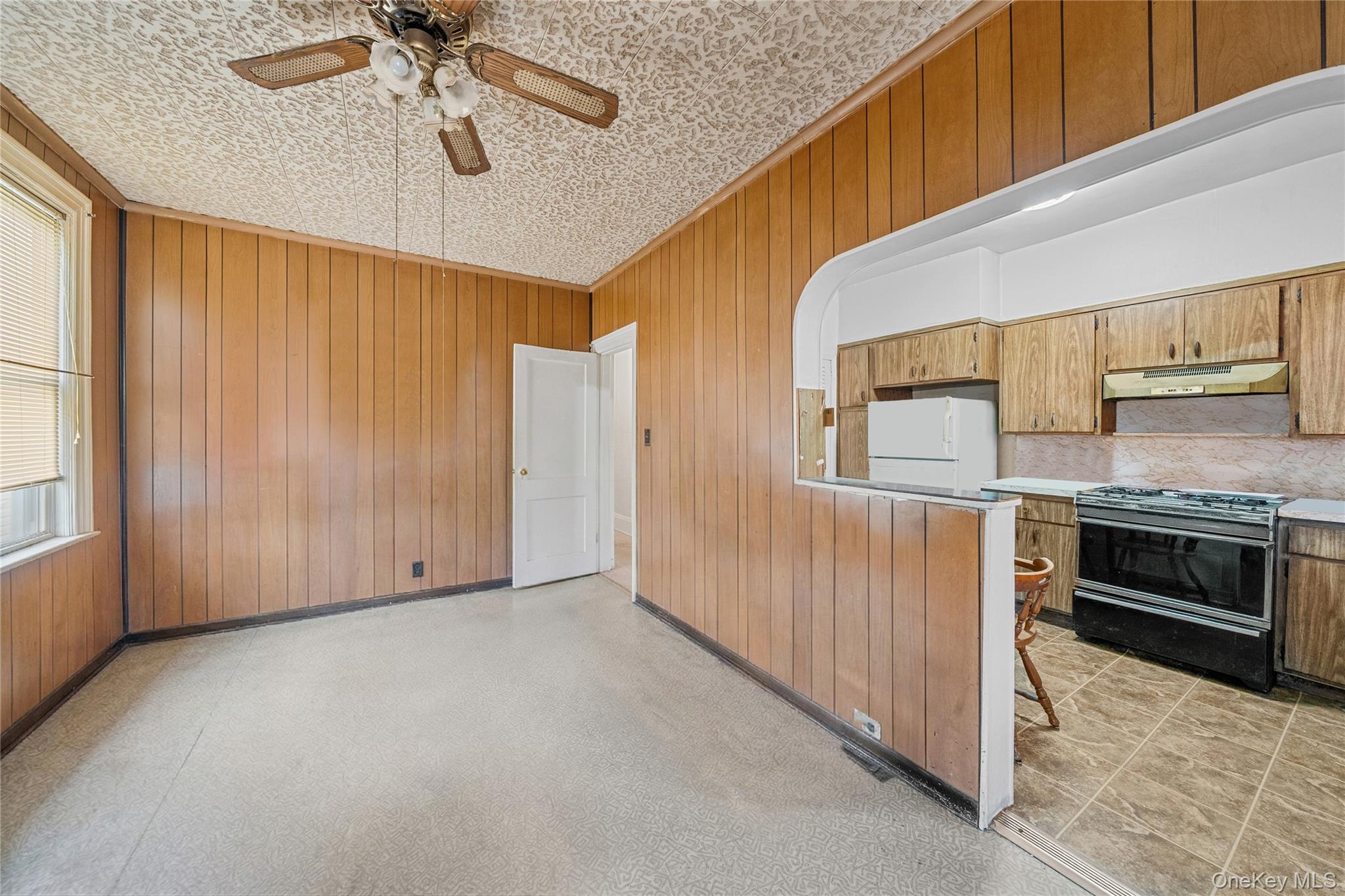 39-27 57th Street Queens, NY 11377 - Photo 7 of 35 a view of an entryway with chandelier