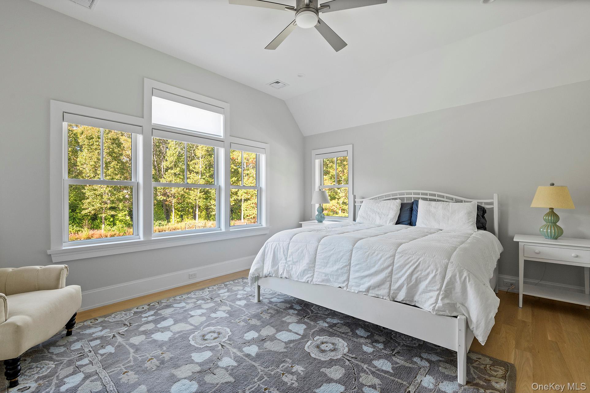 41 Arbutus Road Quogue, NY 11959 - Photo 27 of 35 a bedroom with a bed and a couch
