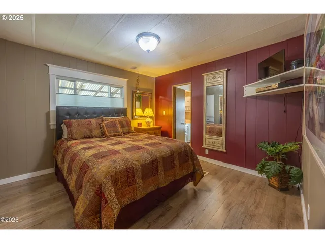 a bathroom with a sink vanity and mirror