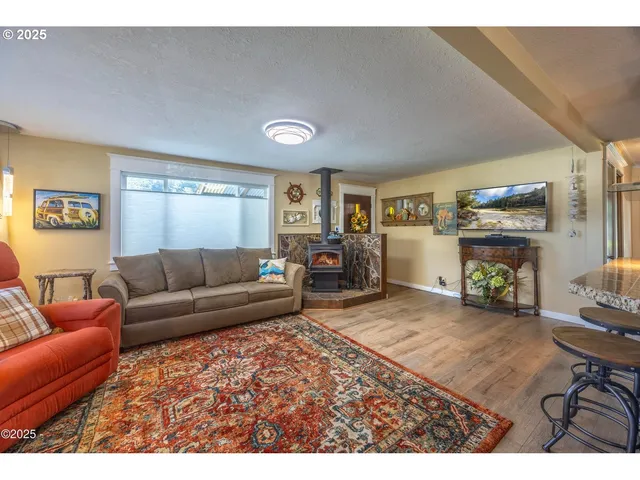 a outdoor living space with furniture and a floor to ceiling window