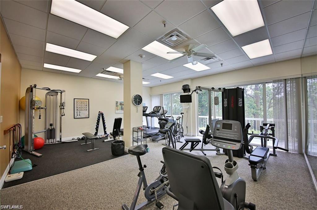 5501 Heron Point Drive, Unit 204 Naples, FL 34108 - Photo 22 of 23 a view of a room with gym equipment