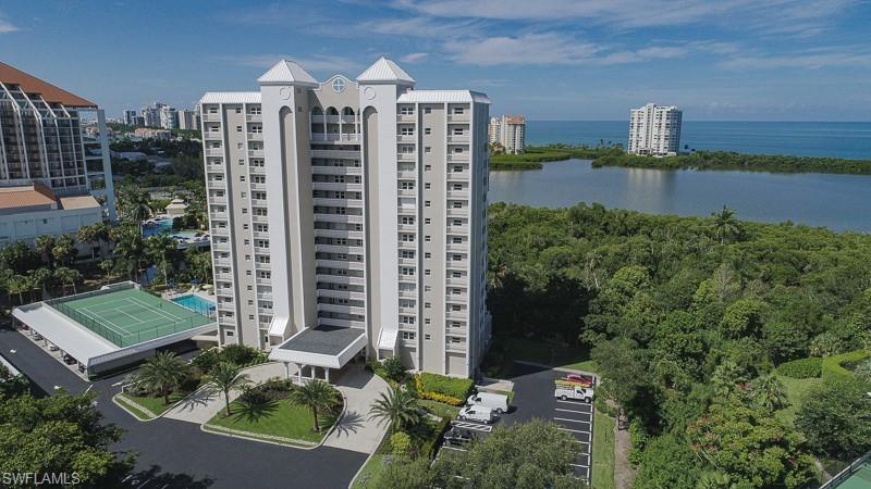 5501 Heron Point Drive, Unit 204 Naples, FL 34108 - Photo 23 of 23 a view of a city with tall buildings