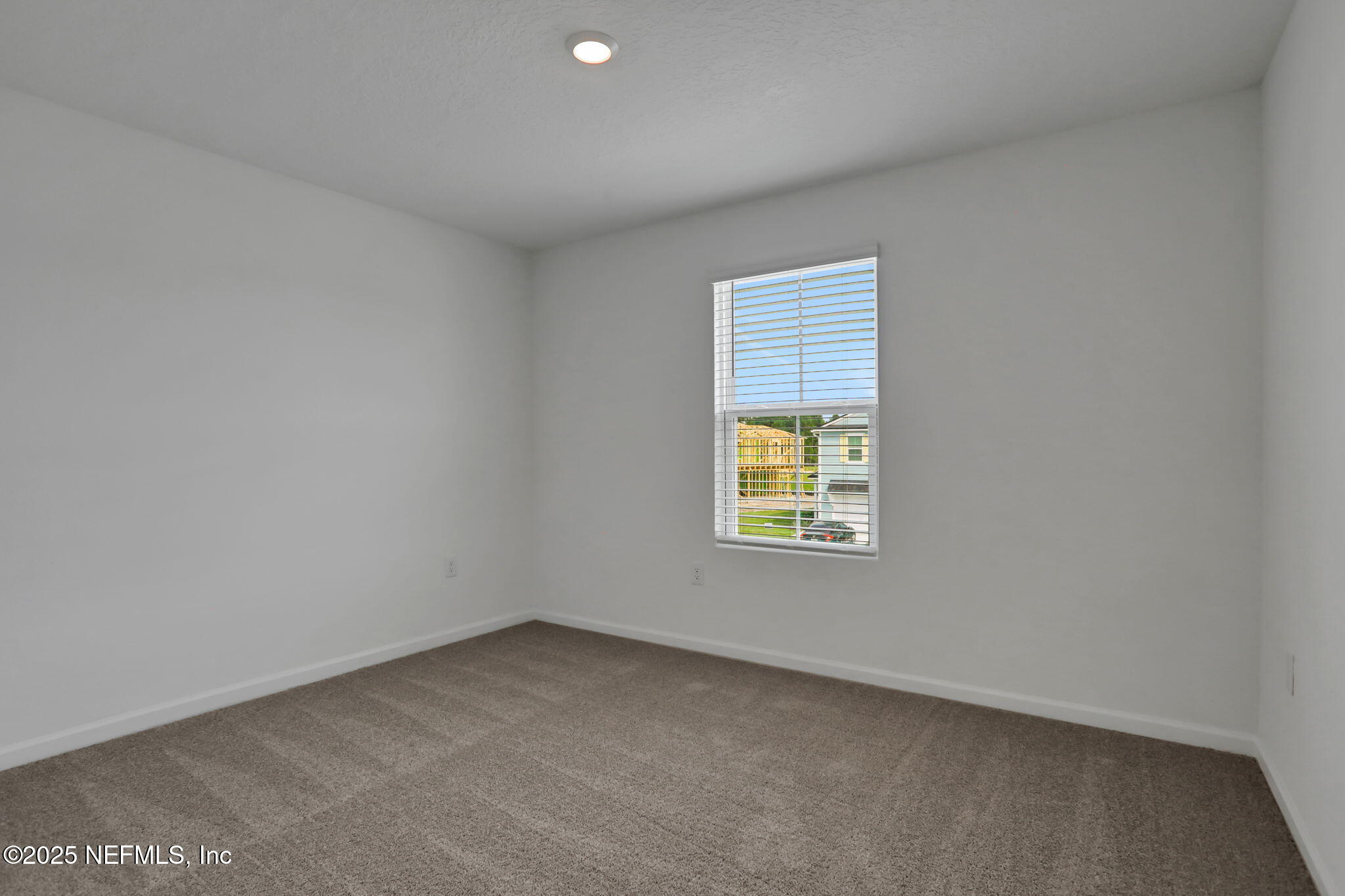 3765 Athenian Way Middleburg, FL 32068 - Photo 10 of 61 an empty room with a window