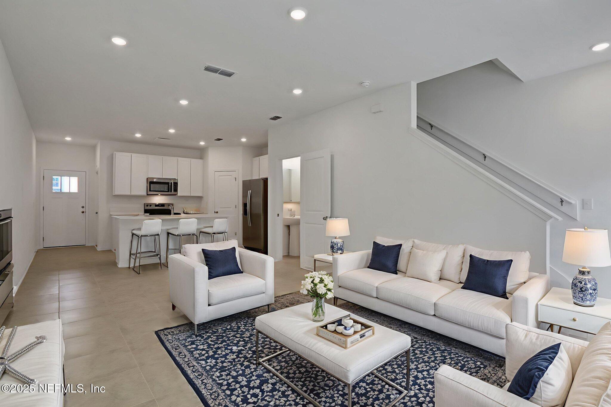 3765 Athenian Way Middleburg, FL 32068 - Photo 26 of 61 a living room with furniture and a rug