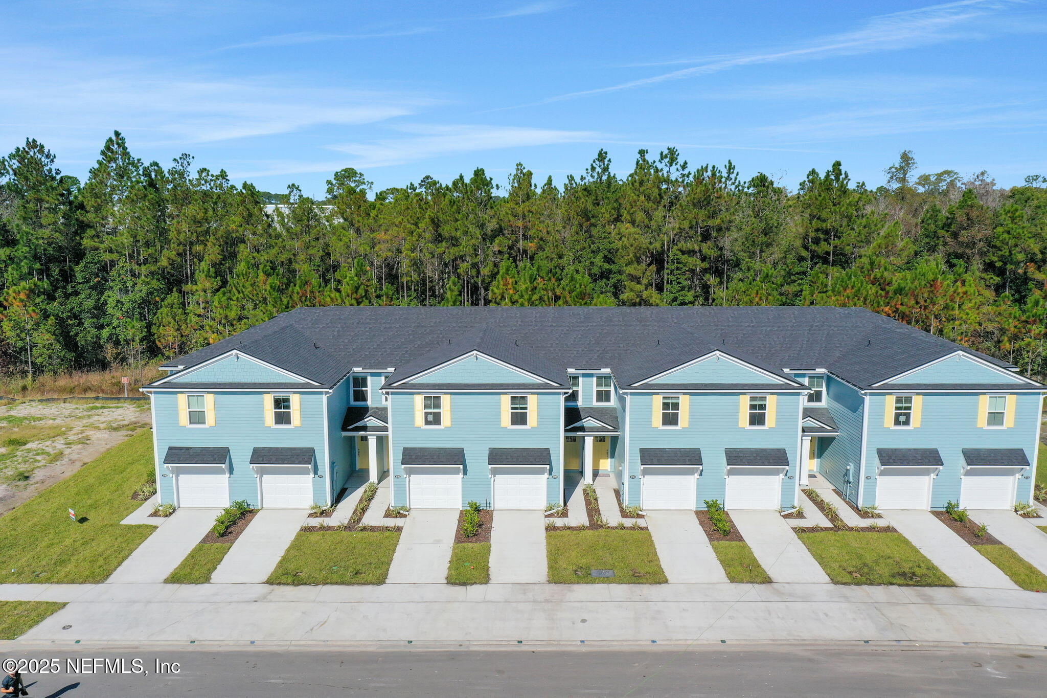 3765 Athenian Way Middleburg, FL 32068 - Photo 41 of 61 a front view of house and yard with swimming pool and trees in the background