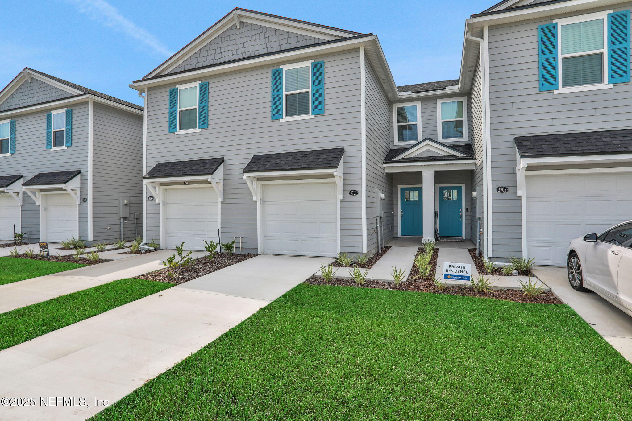 3765 Athenian Way Middleburg, FL 32068 - Photo 4 of 61 a front view of a house with a yard and garage