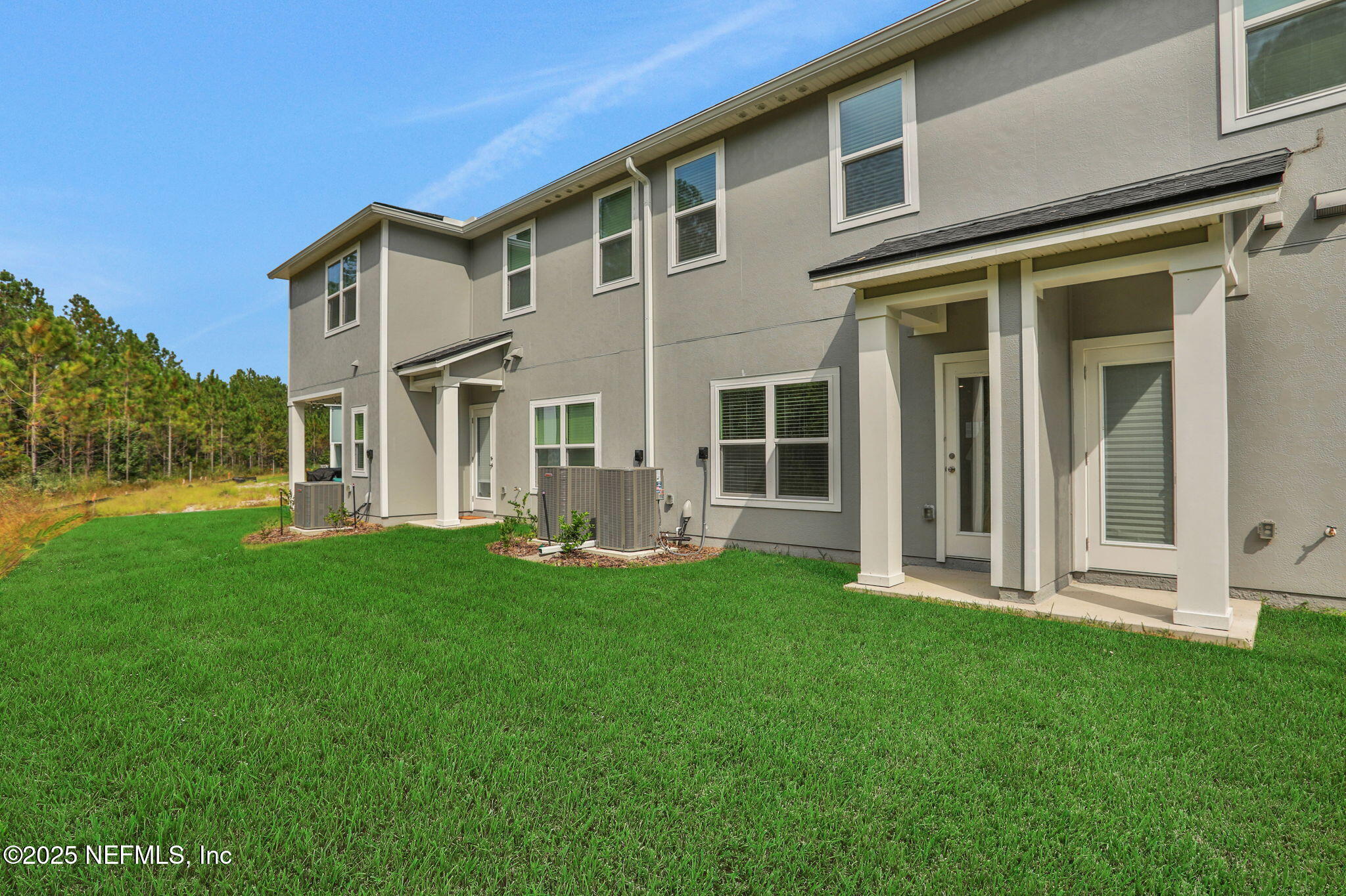 3765 Athenian Way Middleburg, FL 32068 - Photo 6 of 61 a front view of a house with a yard