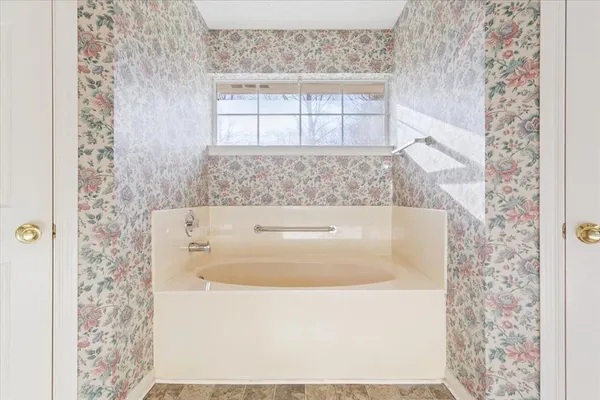 a bathroom with a bathtub