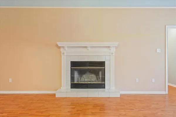 a white building with a fireplace