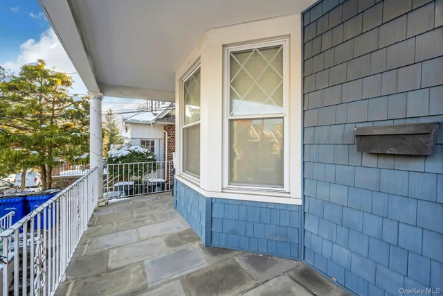a view of a porch with wooden floor and outdoor space