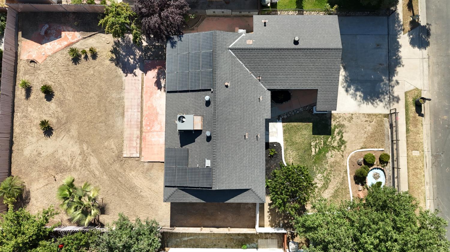 4680 East Grove Avenue Fresno, CA 93725 - Photo 19 of 19 an aerial view of a house with a yard