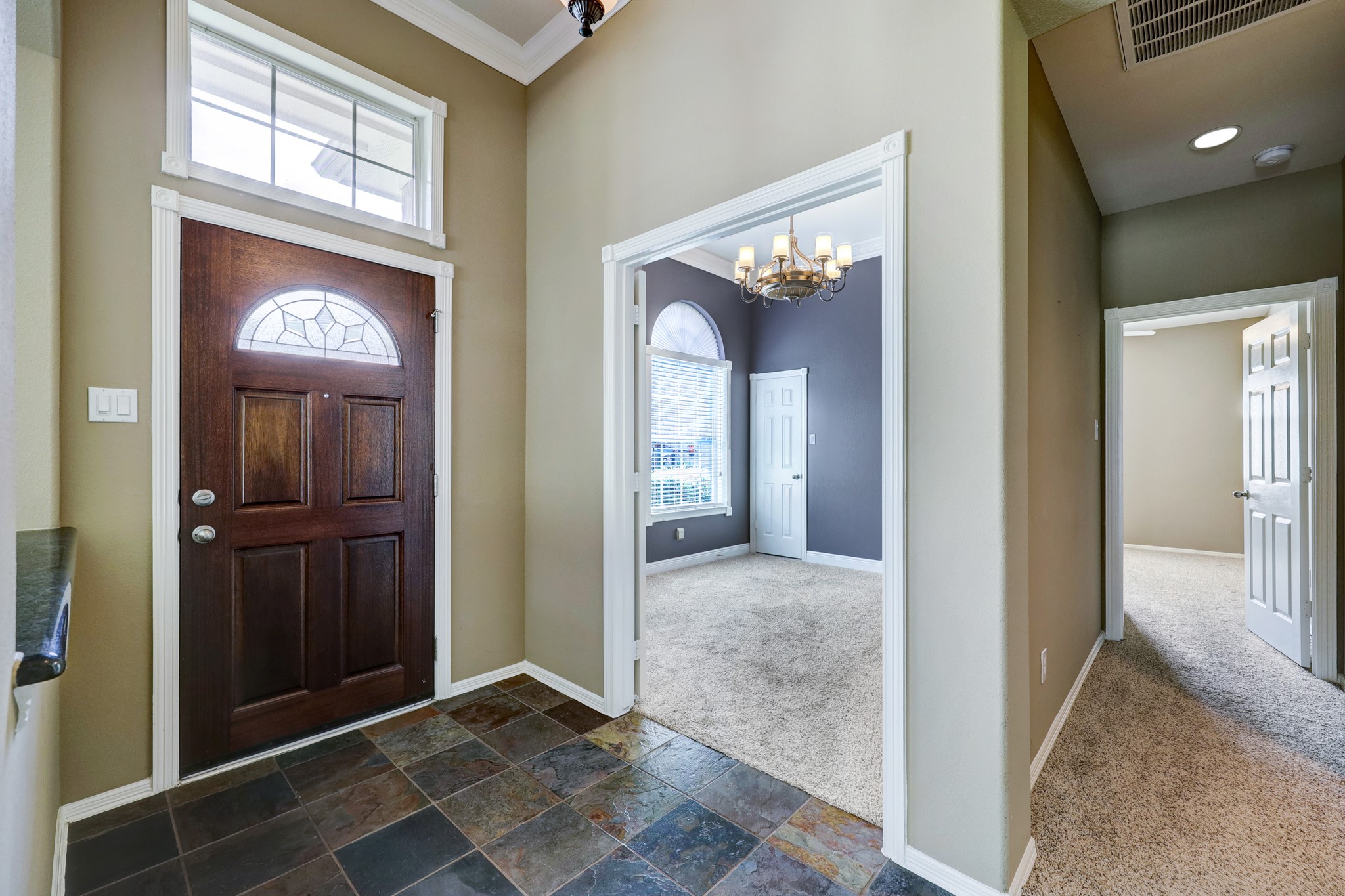 18618 Jaya Loch Court Spring, TX 77379 - Photo 3 of 18 a view of an entryway door and a livingroom