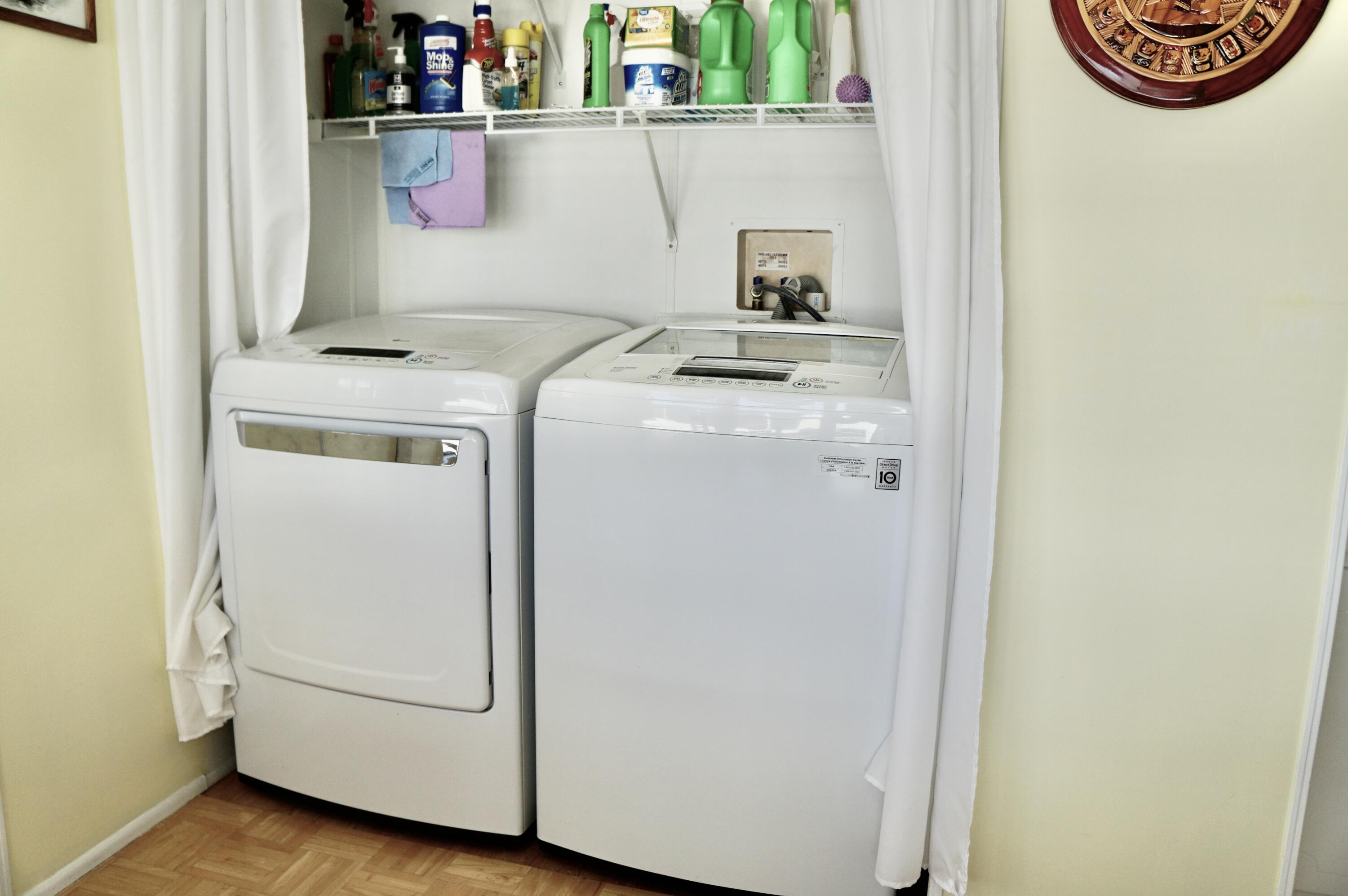 14333 Azucena Court Fort Pierce, FL 34951 - Photo 11 of 28 a utility room with dryer and washer