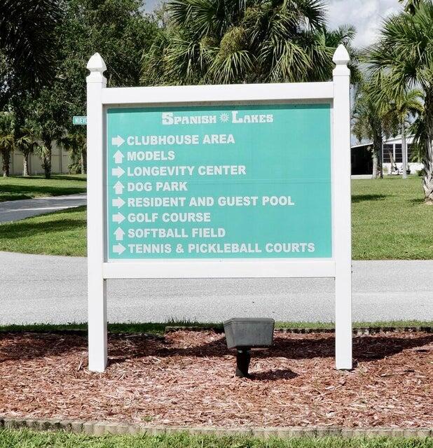 14333 Azucena Court Fort Pierce, FL 34951 - Photo 21 of 28 a view of swimming pool with a yard