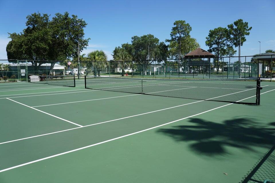 14333 Azucena Court Fort Pierce, FL 34951 - Photo 22 of 28 a view of a tennis court