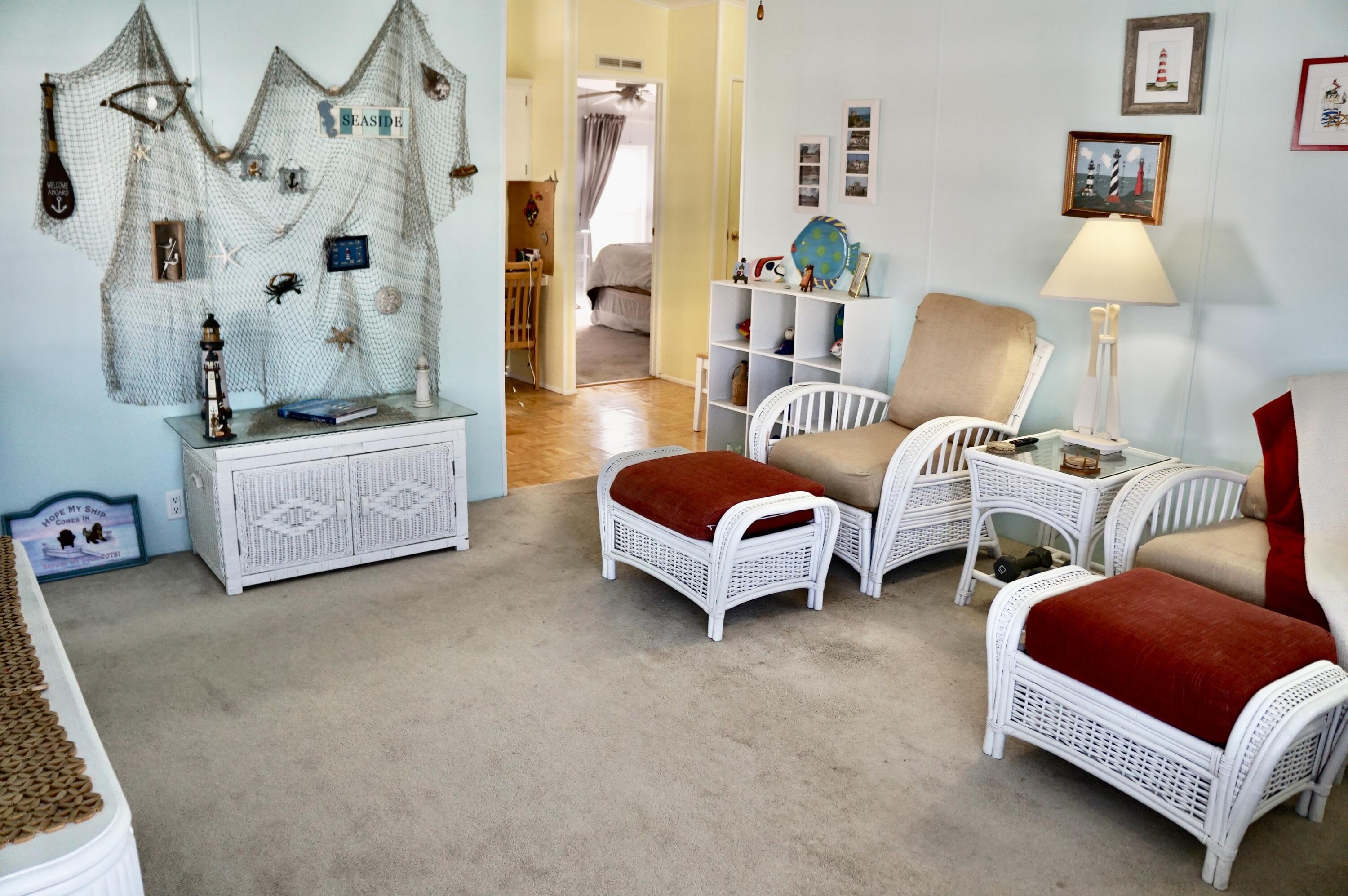 14333 Azucena Court Fort Pierce, FL 34951 - Photo 5 of 28 a living room with furniture and a lamp