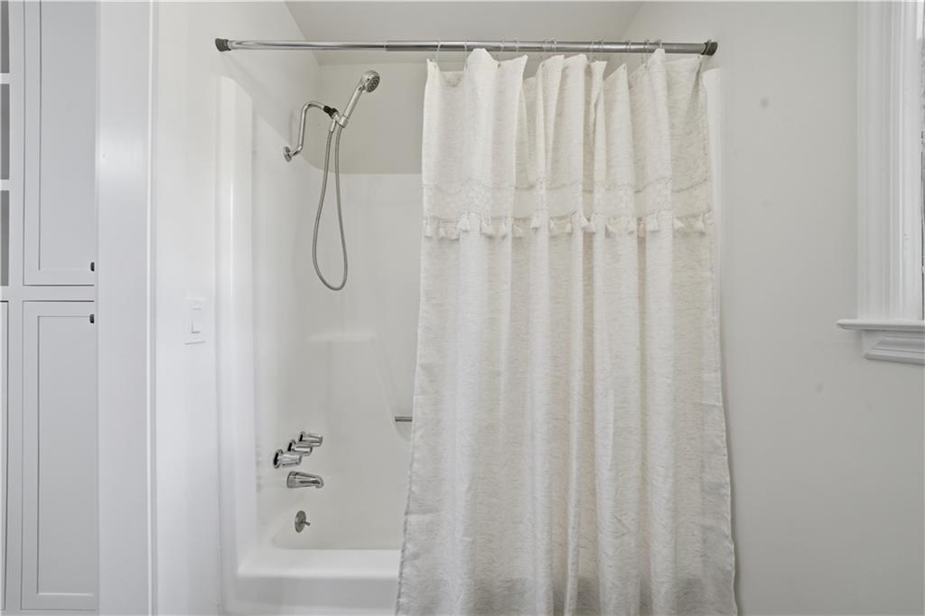 125 Childers Road Canton, GA 30115 - Photo 30 of 48 a bathroom with a shower