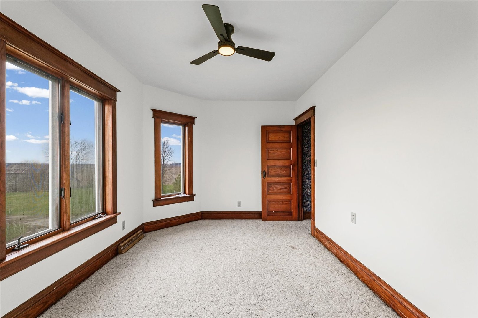 7961 North 3000 E Road Forrest, IL 61741 - Photo 31 of 66 a view of an empty room with a window