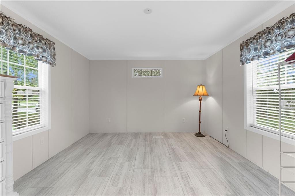 318 Meadowbrook Road Hermitage, PA 16148 - Photo 12 of 18 a view of empty room with windows