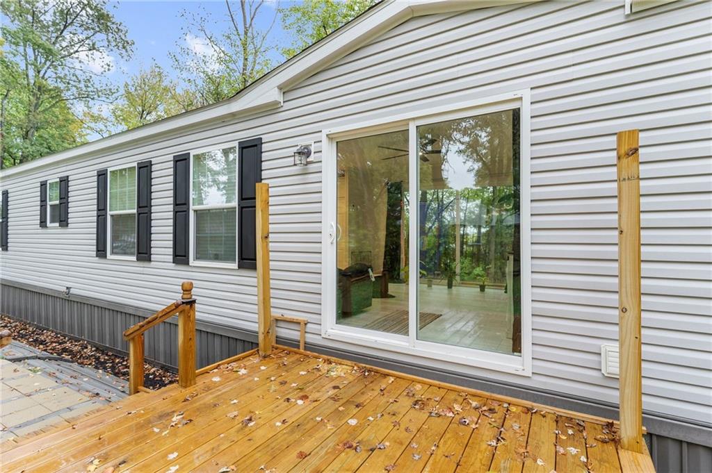 318 Meadowbrook Road Hermitage, PA 16148 - Photo 4 of 18 a view of a house with large windows