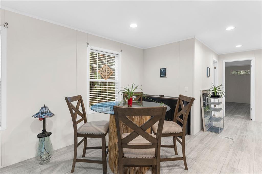 318 Meadowbrook Road Hermitage, PA 16148 - Photo 8 of 18 a dining room with furniture and window