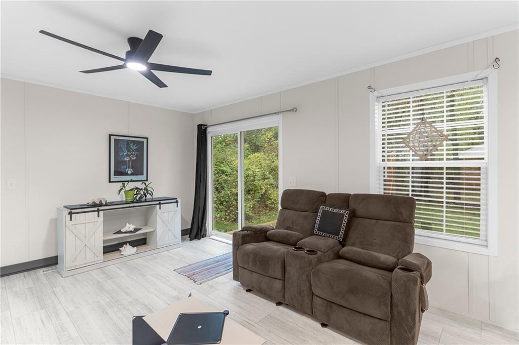 318 Meadowbrook Road Hermitage, PA 16148 - Photo 9 of 18 a living room with furniture and a window