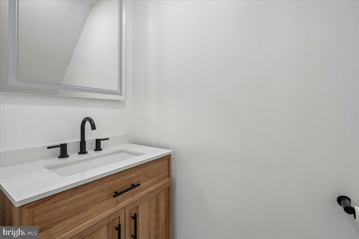 100 Rugby Fredericksburg, VA 22406 - Photo 40 of 41 Sleek modern bathroom with elegance.