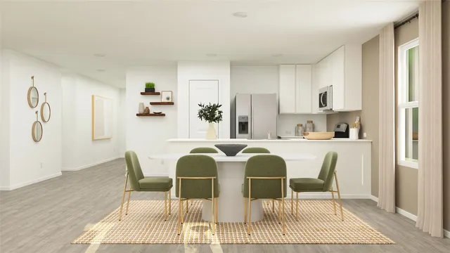 a dining room with furniture and window